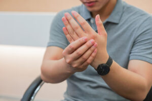 Find Lasting Carpal Tunnel Relief in Little River, SC, A person holding their hand