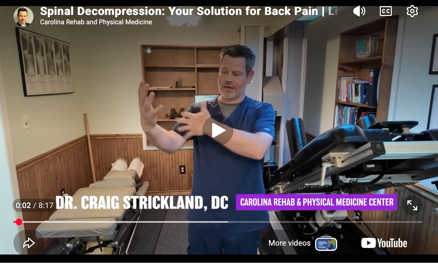 Doctor explains spinal decompression therapy for back pain at Carolina Rehab and Physical Medicine Center.